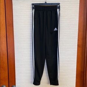 Adidas Kids Black Joggers with White Stripes size medium great condition